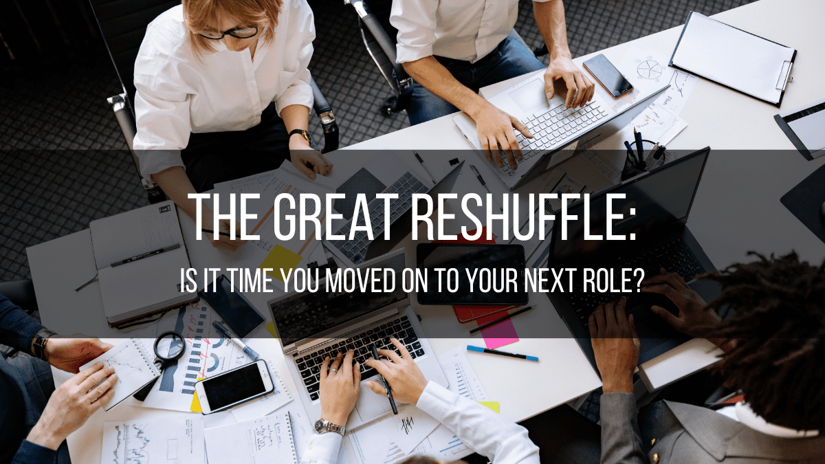 Blog header - image of people working with text overlay - The Great Reshuffle. Is it time to find a new job