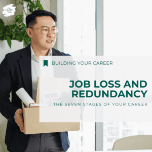 the words A series: Seven Stages of your Career - Job Loss and Redundancy are superimposed over a man wearing a suit jacket, holding a box of possessions form his desk.